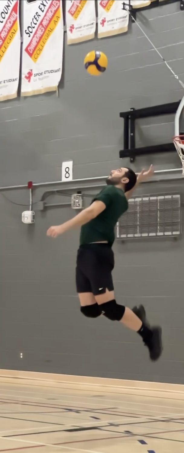 Volleyball player serving
